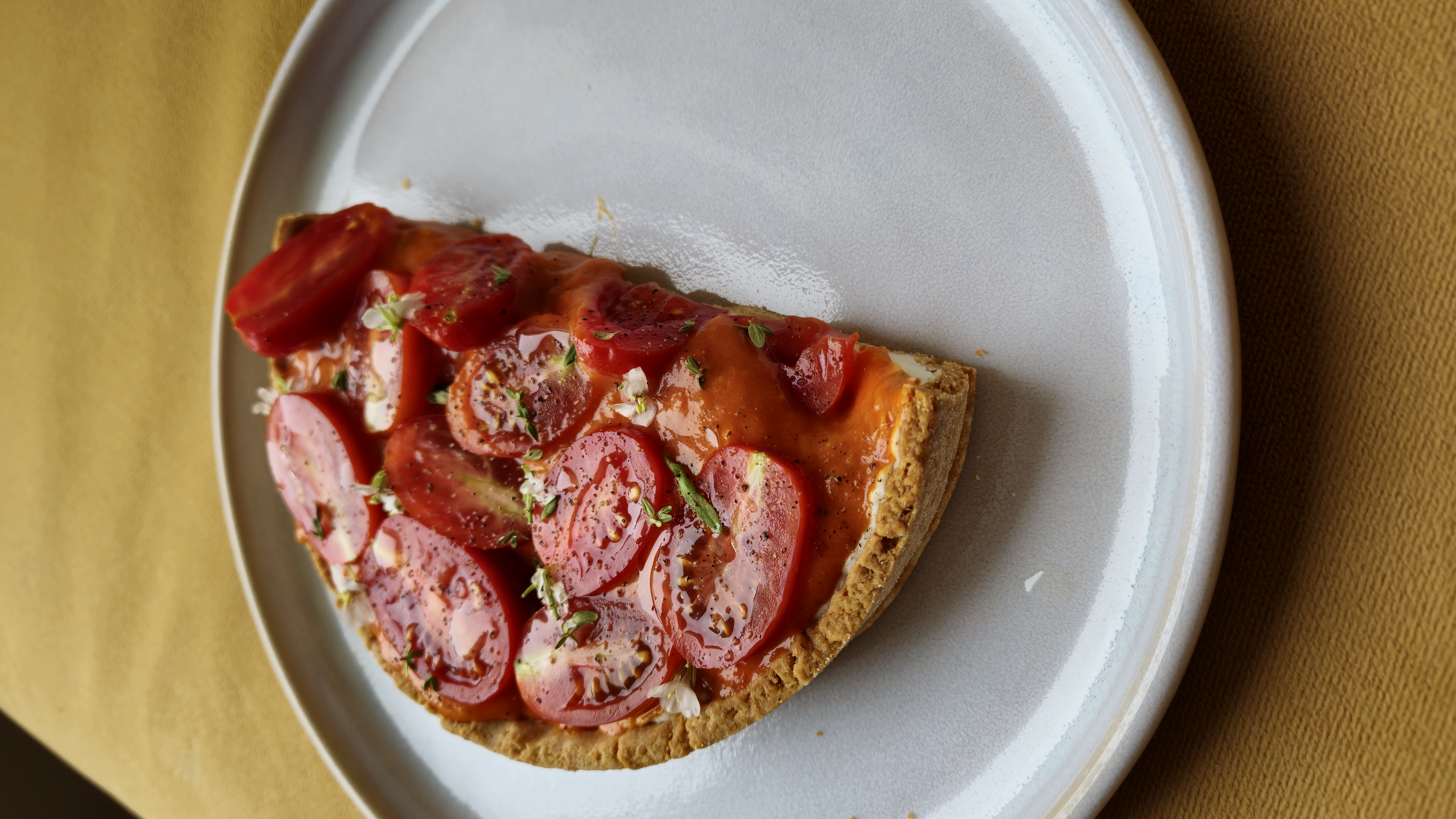 Heirloom tomato tart with herbs and flowers
