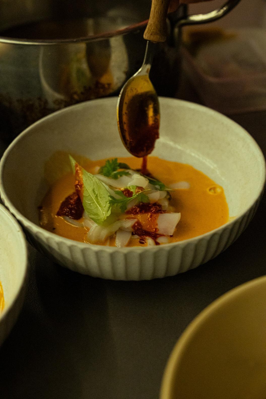 Broth with citrus and chili oil