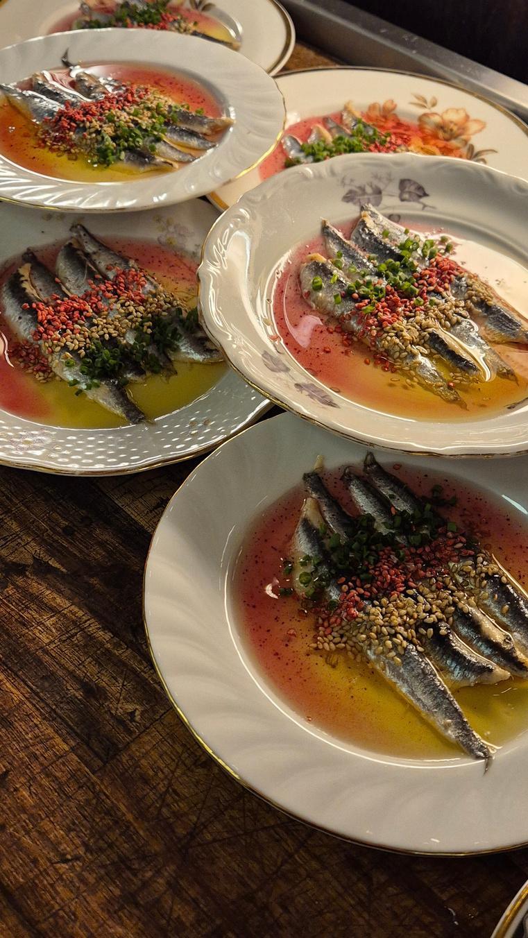 Cured sardines with red pepper sauce