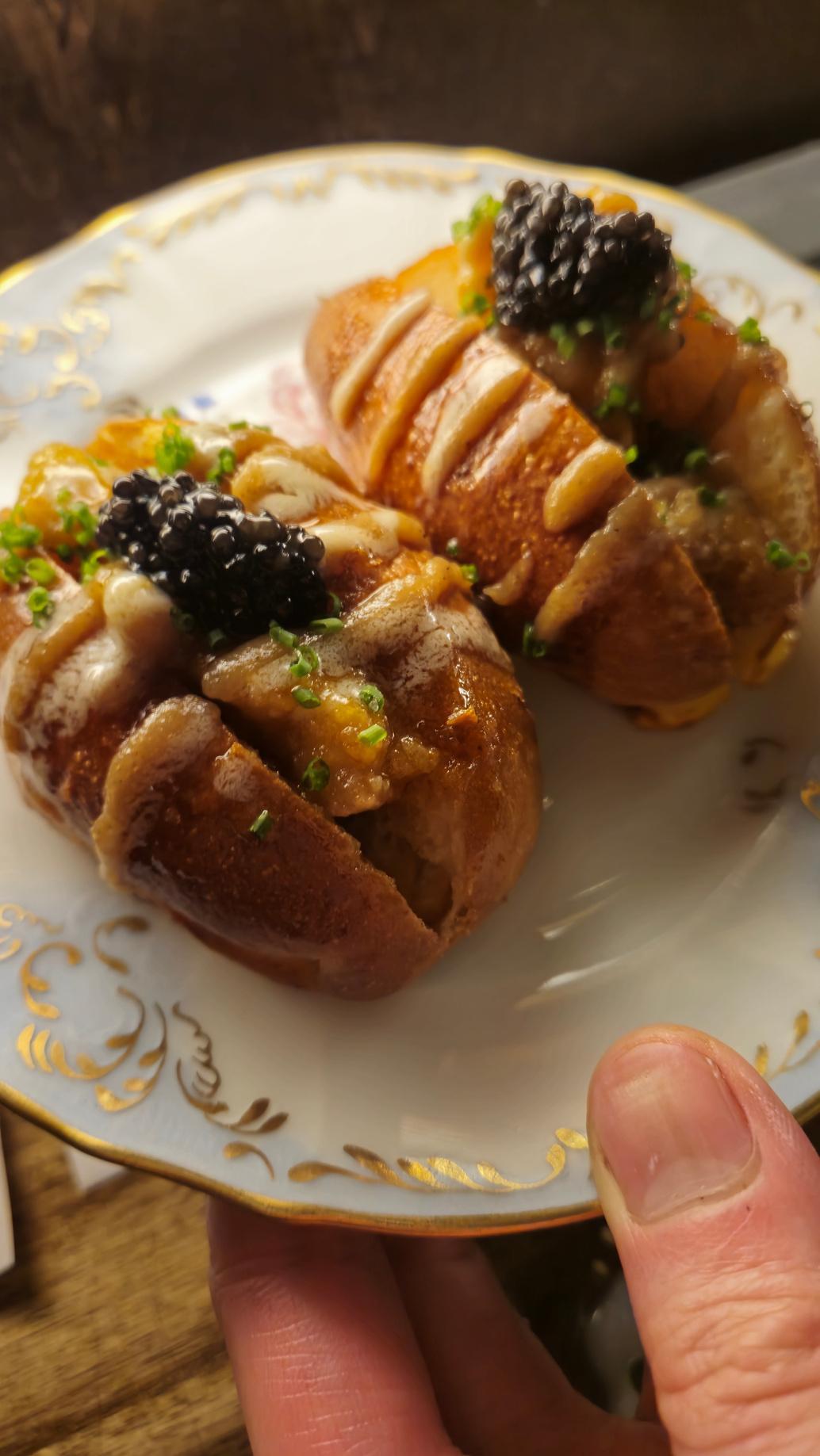 Caviar-topped bread rolls