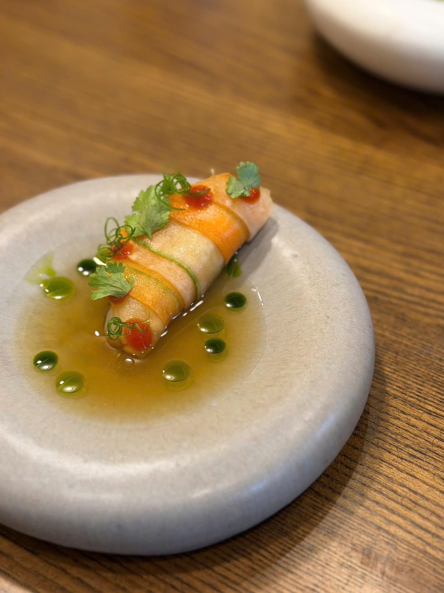 Wrapped spring roll with herb oil